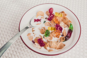 Bowl of cereal with gummy worms and gummy bears