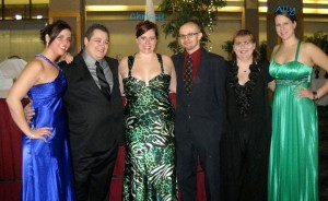 Group of Jaycees at a regional meeting formal event in gowns and suits