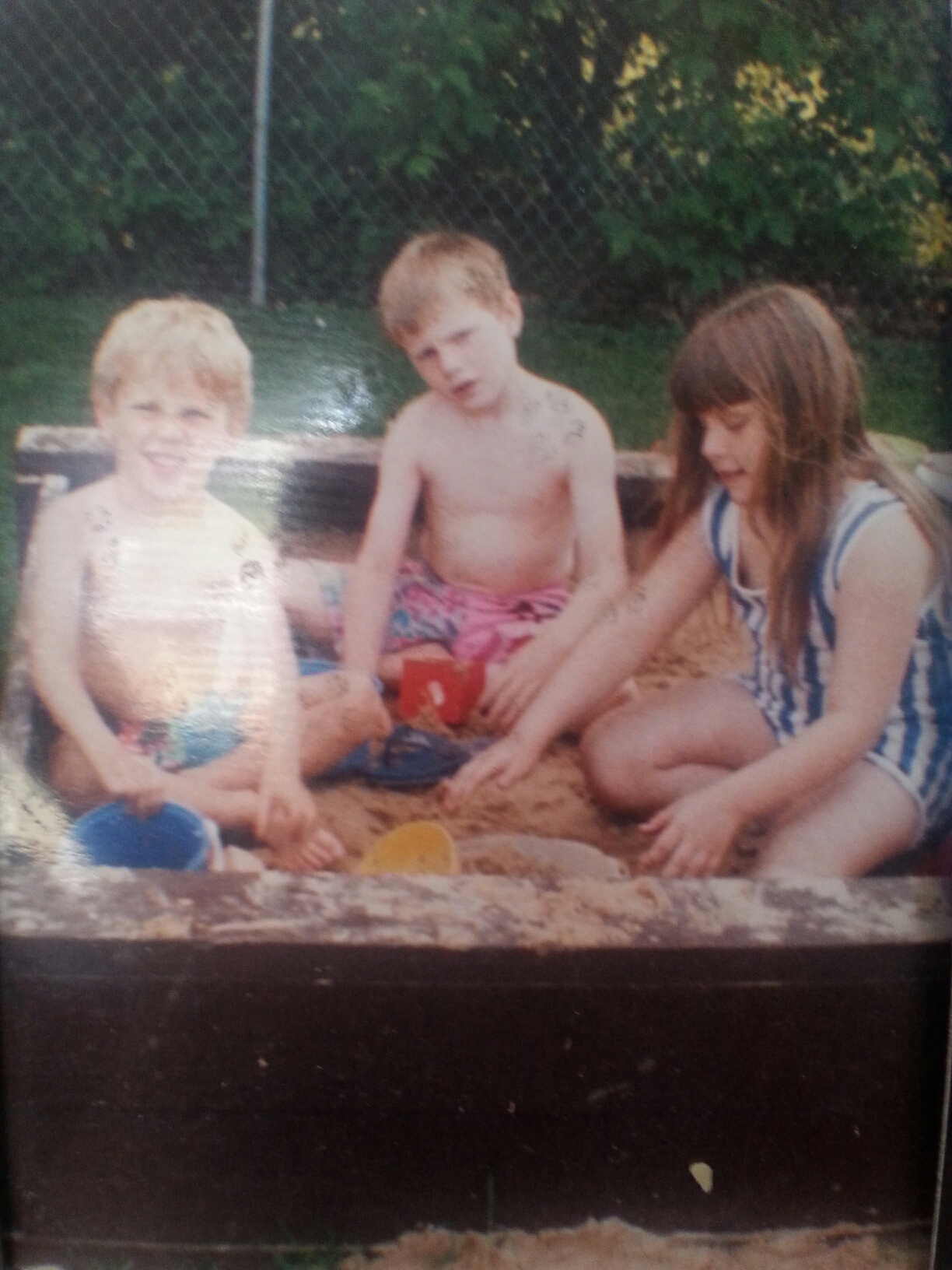 thowback Thursday cousins playing in the sand image