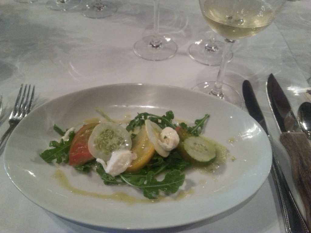 Heirloom tomato and cucumber salad with arugula, burrata and basil vinaigrette