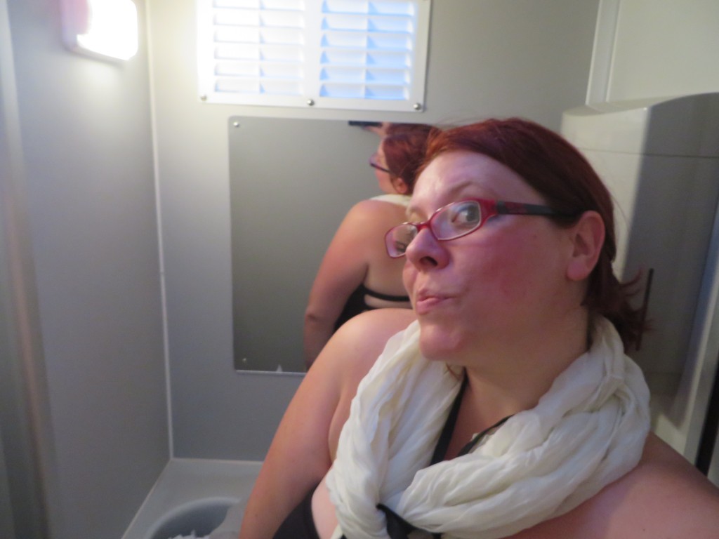 Fashion hack: use a scarf to hold a strapless dress up. ALSO, this may be the nicest port-o-potty ever.