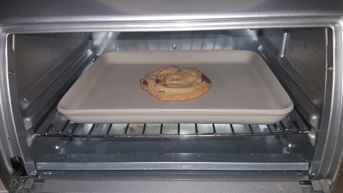 Baking an Otis Spunkmeyer cookie in the toaster oven is easy. Just pop it in at 350 for 5-7 minutes for a warm gooey cookie.