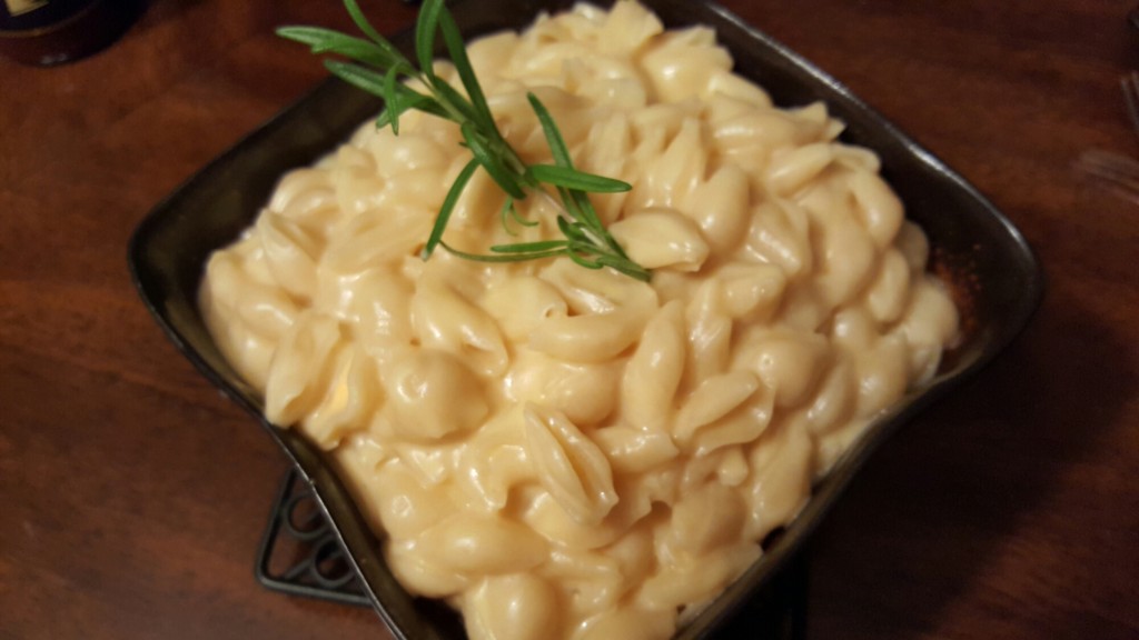 Serving creamy homemade mac and cheese