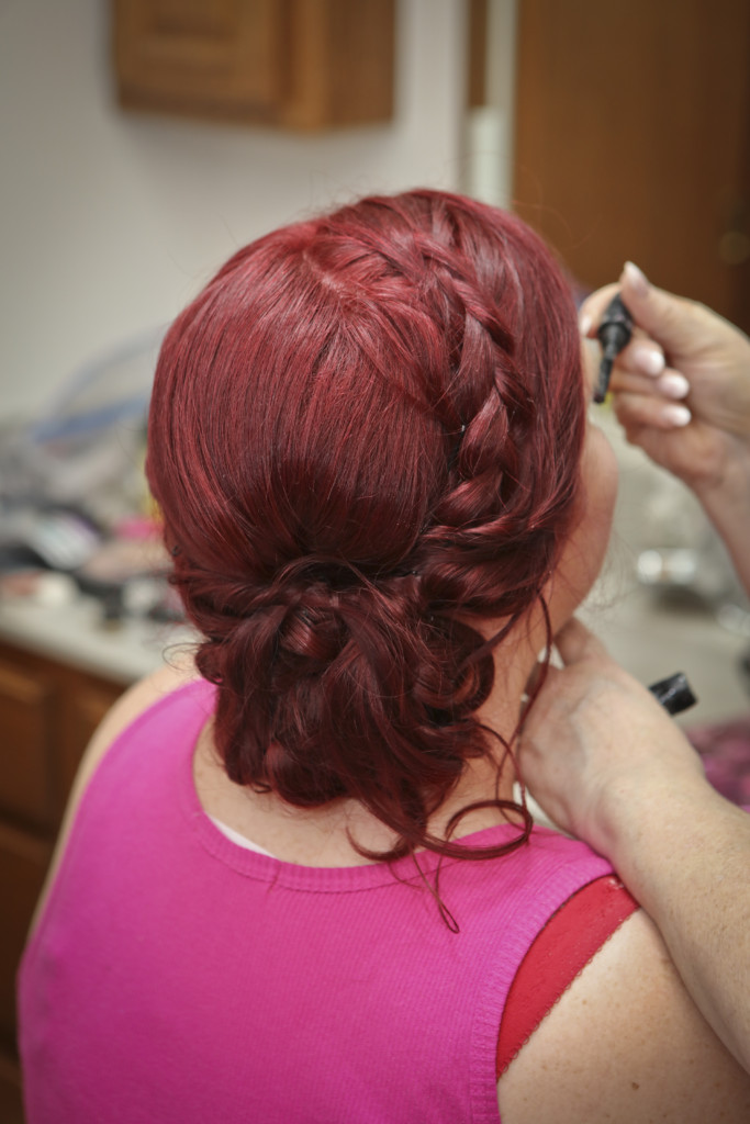 I wanted a boho chic, but sleek wedding hairdo with a side braid and curls and low-side pouf. My hairdresser nailed it.