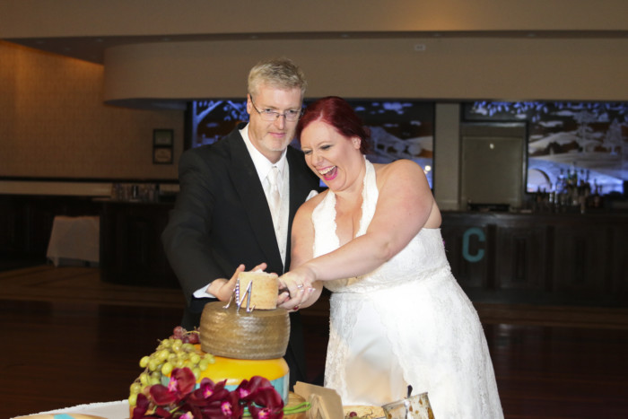As I was cutting the cheese cake with my new husband., we kept laughing