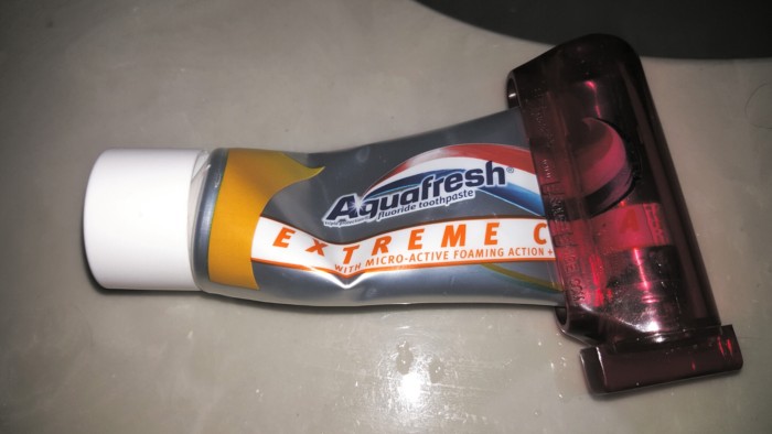 Toothpaste roller Aquafresh toothpaste in a toothpaste roller
