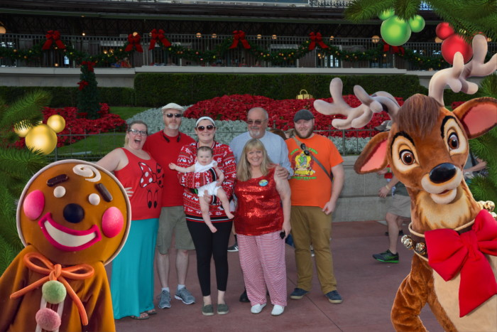 Family in front of Magic Kingdom Entrance with Magic Shot