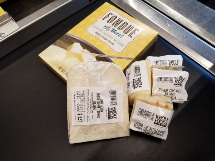 Buying cheese at Whole Foods for National Cheese Lover's Day