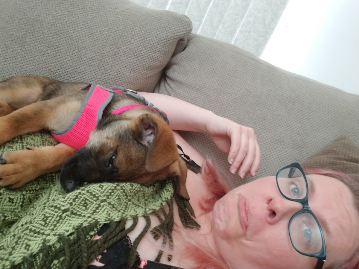 A sleeping puppy on your tummy is probably one of the greatest things ever.