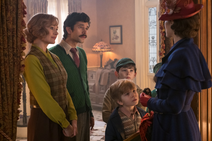 Jane (Emily Mortimer), Michael (Ben Whishaw), John (Nathanael Saleh) and Georgie (Joel Dawson) greet Mary Poppins (Emily Blunt) upon her return to the Banks' home in Disney's original musical MARY POPPINS RETURNS