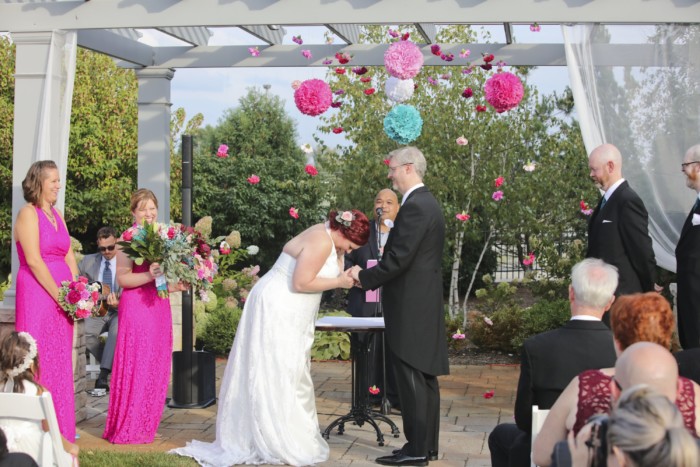 hilarious professional wedding photos laughing throughout the ceremony