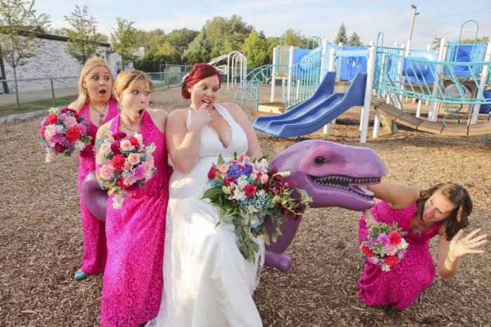 hilarious professional wedding photos  at a playground