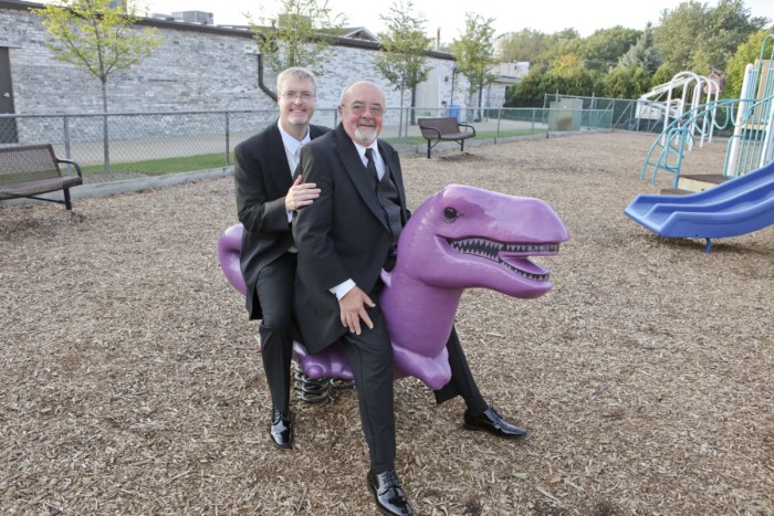 hilarious professional wedding photos  at a playground