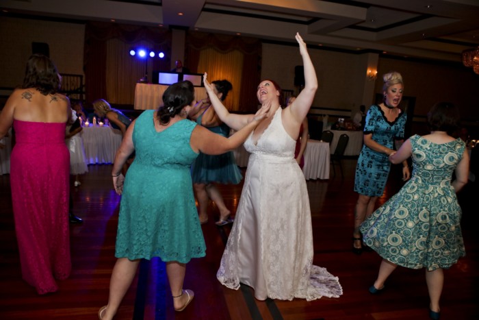 hilarious professional wedding photos: Dancing to Time After Time from Romy and Michelle's High School Reunion