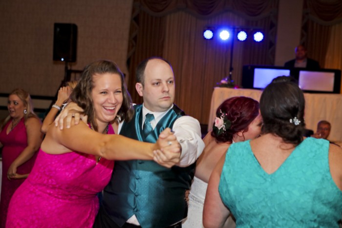hilarious professional wedding photos: Dancing to Time After Time from Romy and Michelle's High School Reunion
