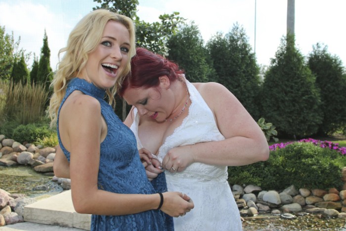 hilarious professional wedding photos  dresses stuck together