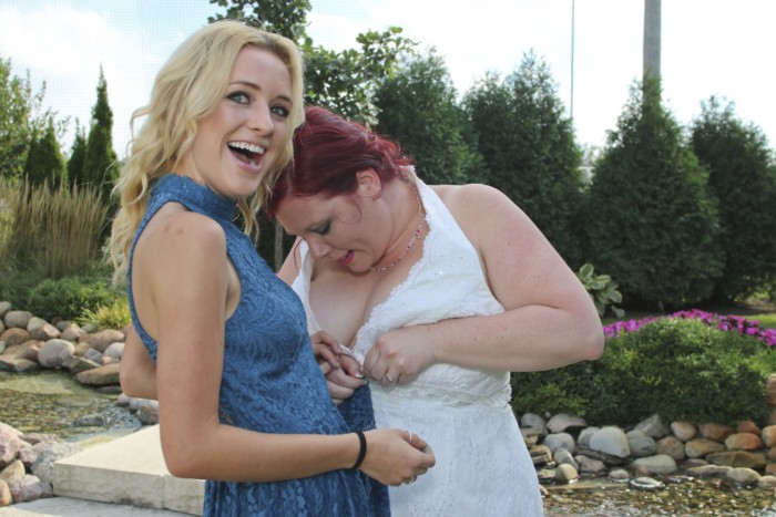 hilarious professional wedding photos dresses stuck together