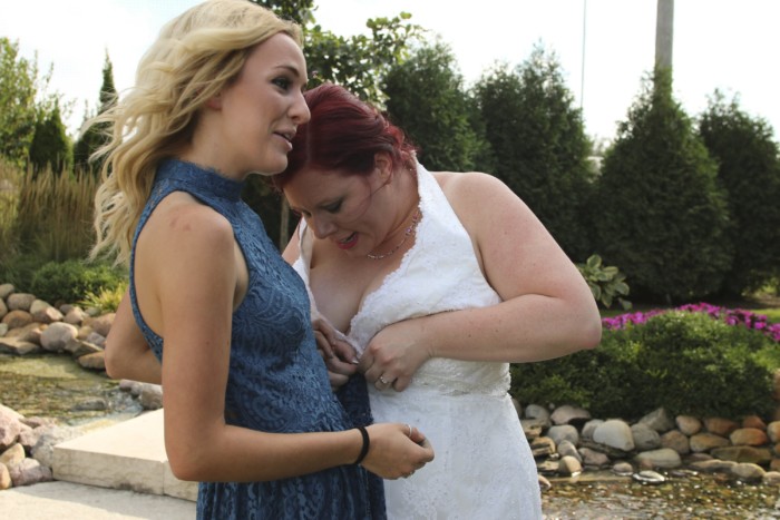 hilarious professional wedding photos dresses stuck together