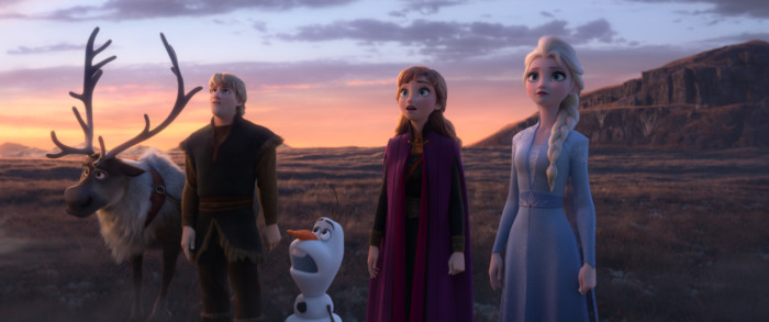 The whole Frozen squad (Anna, Elsa, Kristoff, Olaf, and Sven) stare in awe into the unknown.