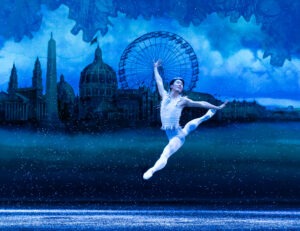 A dancer leaps through the air with the 1893 World's Fair in Chicago backdrop